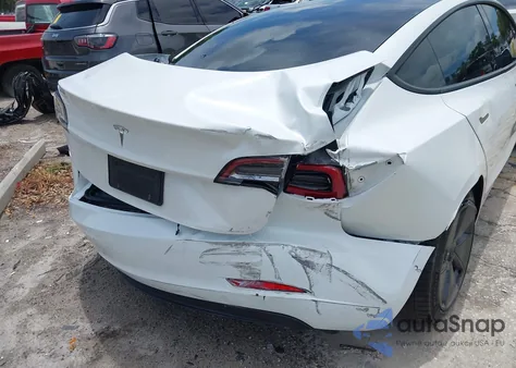 2021 Tesla Model 3 Standard Range Plus Rear-Wheel Drive from USA, damaged, VIN 5YJ3E1EA5MF099704